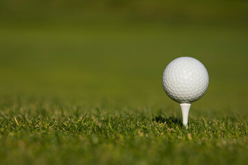 .Golf course with ball and grass