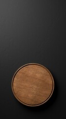 Old rustic empty round wooden cutting or chopping board on black stone background flat lay top view from above with copy space