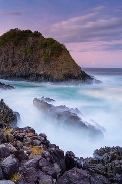 dramatic coastal scene  with rocky cliffs and waves