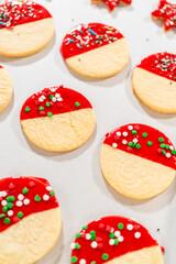 Decorating with Red Melted Chocolate and Vibrant Green Sprinkles
