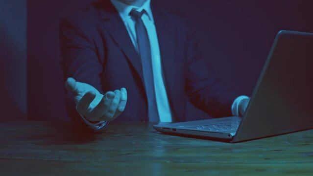 A businessman working on a laptop with one hand demonstrates the capabilities of new technologies in a presentation on working with the digitalization of document flow. Cg
