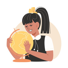 A schoolgirl holds a globe of the earth in her hands
