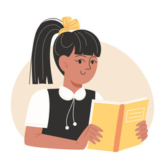 A schoolgirl is reading a textbook