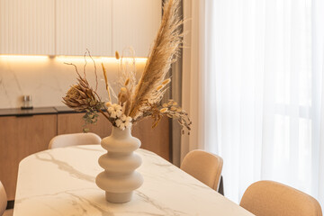 Closeup of a dining room inside a modern home.