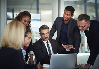 Business people, lawyer and laptop in meeting for teamwork, legal solution and collaboration at law firm. Talking, leadership or attorneys in discussion for feedback, planning or project in corporate