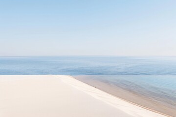 Serene Aerial View of a Desert Meeting the Ocean, Highlighting the Stunning Contrast Between Sandy Shores and Blue Waters