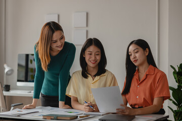 a group of entrepreneur has a small meeting in their office, friends are working together to build a startup company using their carefully thought out strategy to become successful young entrepreneurs