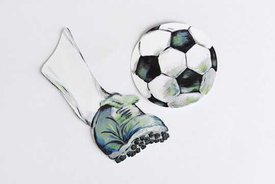 Drawing of a kicked football on white paper