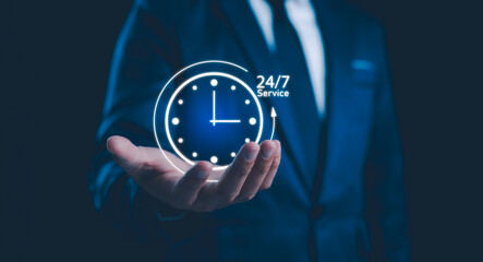 Nonstop service concept. Businessman show virtual 24-7 with clock for worldwide nonstop and full-time available contact of customer service concept. Full-time available contact of service concept.