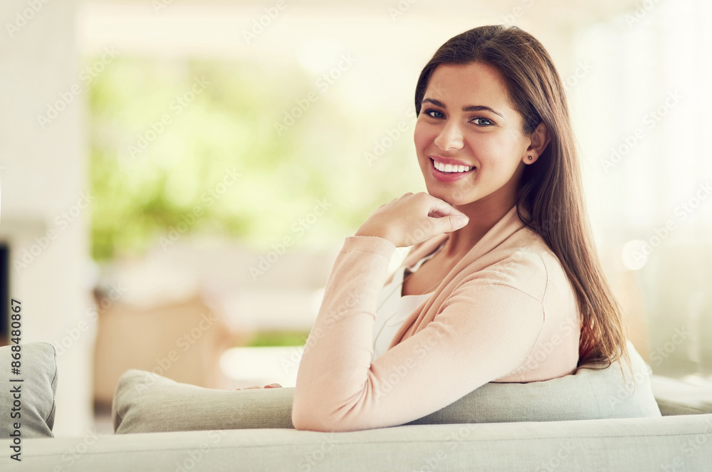 Poster Woman, portrait and relax on couch for peace, happiness and chilling in home on weekend for comfort. Female person, smile and rest in lounge of apartment, morning and homeowner satisfaction for house