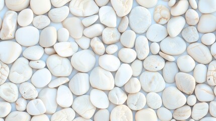 Seamless close-up of smooth white pebbles forming a uniform and calming texture, ideal for spa or zen garden concepts. Serene natural stones.