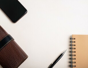 スマホ、財布、ノート、シャーペンが置かれたデスク