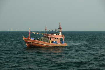 Obraz premium traditional thai fishing boat in the sea