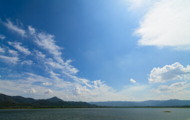  Breathtaking Scenery: Mountains, Water, and Azure Sky - Perfect for Background Design.