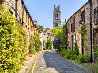 Edinburgh, Circus Lane, full of spring flowers, and with St Stephen's Church.