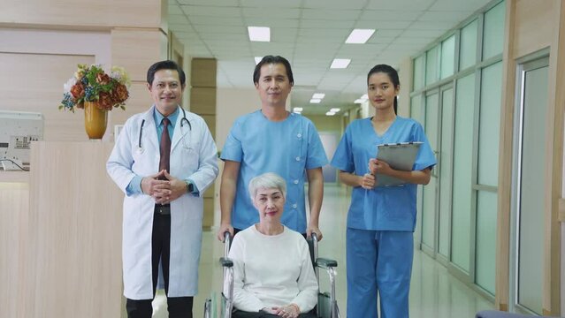 Doctor in front of medical group. Healthcare people group. Doctor working in hospital office or clinic with other doctors and nurse.