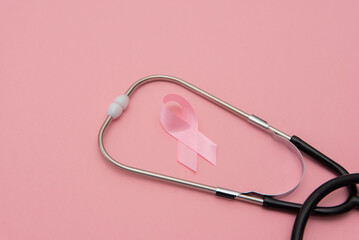 Breast Cancer Awareness Background with Pink Ribbon and Stethoscope