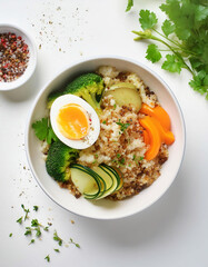 Quinoa bowl mixed vegetables, soft-boiled egg, herbs on a clean white surface, healthy food, nutrition, lifestyle