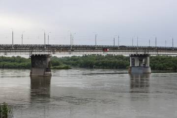 Omsk, Omsk Region, Russian Federation - June 6, 2024. Leningradsky Bridge over the Irtysh River