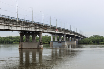 Omsk, Omsk Region, Russian Federation - June 6, 2024. Leningradsky Bridge over the Irtysh River