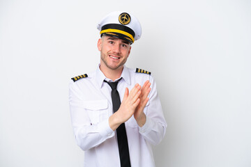 Airplane caucasian pilot isolated on white background applauding after presentation in a conference