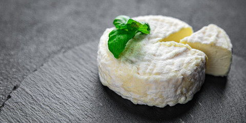 soft cheese goat or sheep cheese natural milkfresh appetizer meal food snack on the table copy...