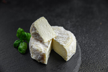 soft cheese goat or sheep cheese natural milkfresh appetizer meal food snack on the table copy space food background rustic top view