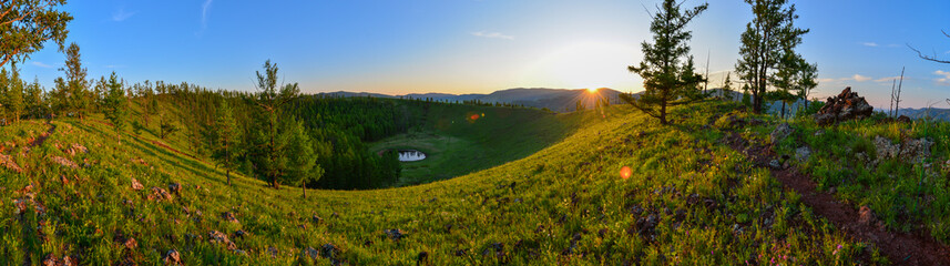 Crater of Uran Togoo volcano during sunset © Benjamin