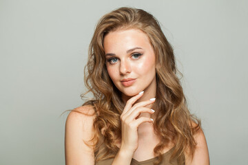 Gorgeous healthy young woman, beautiful face closeup on white background