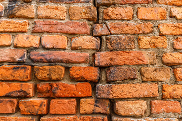 Old, cracked brick wall