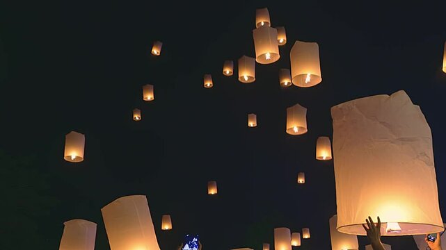 Loy Krathong Festival in Chiang Mai Thailand. Sky lanterns, flying lanterns, floating lanterns, hot-air balloons.