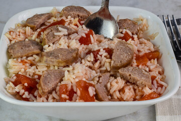 rice with diced tomatoes  and sausages