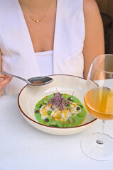 Elegant Dining: Gourmet Dish Paired with a Glass of Wine