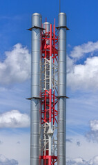 large industrial shiny metal pipes