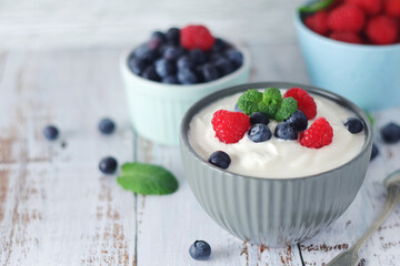 A bowl with Greek yogurt with berries