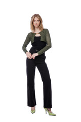 Fototapeta premium High fashion photo of a beautiful elegant young woman in pretty black denim pants, trousers, top, green short jacket posing on white background. Slim figure. Blonde