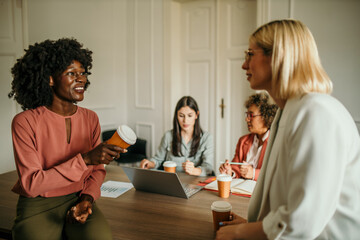 Corporate business persons discussing new project and sharing ideas in the workplace