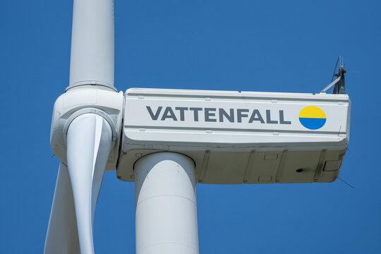 Middenmeer, Netherlands - June 6, 2024: Vattenfall wind turbine against blue sky