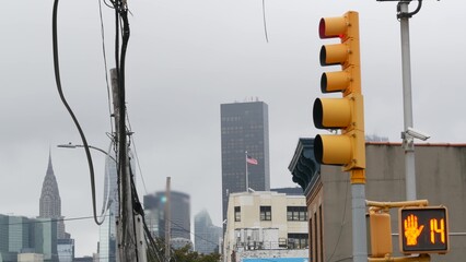 New York City street crossroad, yellow traffic light, transport road intersection, United States....