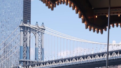 New York City Manhattan Bridge to Brooklyn Dumbo. Retro vintage carousel, USA travel destination. United States tourist landmark. Cable-stayed bridge and old merry-go-round