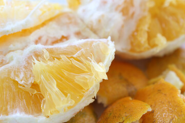 Tangerine details. Tangerine with selective focus. peeled orange fruit.