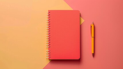 Red Spiral Notebook and Yellow Pen on Orange and Pink Background