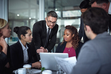 Business people, director and laptop in meeting for leadership, solution and collaboration in...