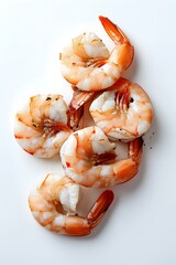several cooked shrimps on a white background