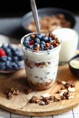 Overnight oat with berries and white yogurt in a glass
