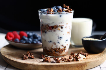 Overnight oat with berries and white yogurt in a glass