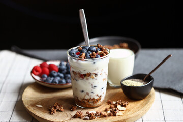 Overnight oat with berries and white yogurt in a glass