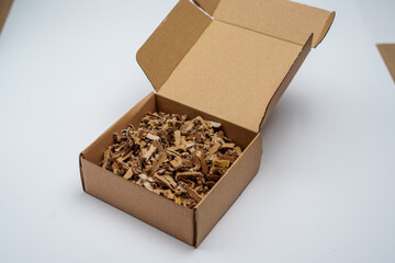 Eco-Friendly Packaging: Paper Box Filled with Shredded Paper Filler