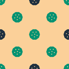 Green and black Cookie or biscuit with chocolate icon isolated seamless pattern on beige background. Vector