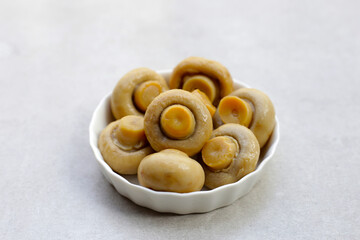 Champignon mushrooms in brine. Canned champignon mushrooms whole